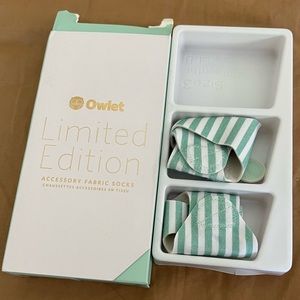 Two owlet sock covers